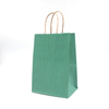 Bolsas de papel con rayas verdes